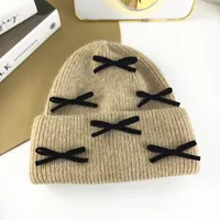 Women's Cute Classic Style Solid Color Bow Knot Eaveless Wool Cap sku image 10