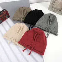 Women's Simple Style Solid Color Flower Drawstring Crimping Wool Cap main image 1