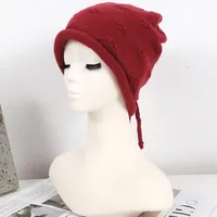 Women's Simple Style Solid Color Flower Drawstring Crimping Wool Cap main image 5