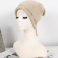 Women's Simple Style Solid Color Flower Drawstring Crimping Wool Cap main image 8