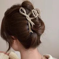 Women's Simple Style Bow Knot Arylic Hollow Out Hair Claws main image 2