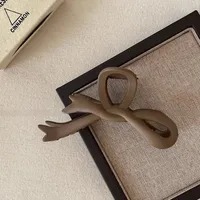 Women's Simple Style Bow Knot Arylic Hollow Out Hair Claws sku image 4
