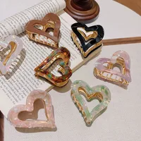 Women's Simple Style Heart Shape Alloy Resin Hollow Out Hair Claws main image 1
