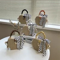 Women's Medium Straw Solid Color Vacation Beach Ribbon Weave Lock Clasp Straw Bag main image 1