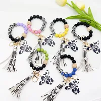 Retro Cow Pattern Alloy Wood Silica Gel Unisex Keychain main image 1
