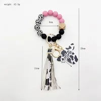 Retro Cow Pattern Alloy Wood Silica Gel Unisex Keychain main image 5