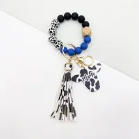 Retro Cow Pattern Alloy Wood Silica Gel Unisex Keychain sku image 1