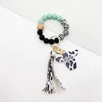 Retro Cow Pattern Alloy Wood Silica Gel Unisex Keychain sku image 4