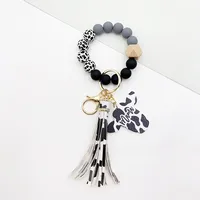 Retro Cow Pattern Alloy Wood Silica Gel Unisex Keychain sku image 11