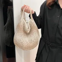 Women's Medium Straw Solid Color Vacation Classic Style Hollow Bucket Magnetic Buckle Crossbody Bag main image 3