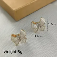 1 Pair Streetwear Commute Triangle Heart Shape Bow Knot Alloy Acrylic Zircon Gold Plated Ear Studs sku image 6