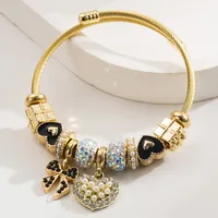 Simple Style Classic Style Commute Heart Shape Bow Knot Alloy Beaded Inlay Rhinestones Pearl Beads K Gold Plated Women's Bangle main image 4