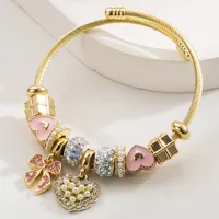 Simple Style Classic Style Commute Heart Shape Bow Knot Alloy Beaded Inlay Rhinestones Pearl Beads K Gold Plated Women's Bangle sku image 4