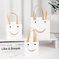 Simple Style Smiley Face Kraft Paper White Cardboard Storage Bag main image 2