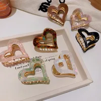 Women's Simple Style Heart Shape Alloy Resin Hollow Out Hair Claws main image 4