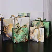 Cross-border Gift Bag Exquisite Gift Bag Spot Paper Bag Packaging Bag White Cardboard Handbag Candy Bag Double Ribbon main image 1