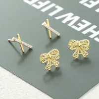 1 Pair Elegant Simple Style Letter Bow Knot Copper Ear Studs main image 1