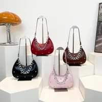 Women's Small Pu Leather Heart Shape Solid Color Streetwear Rivet Pillow Shape Zipper Shoulder Bag main image 1
