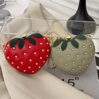 Women's Medium Pu Leather Strawberry Cute Rivet Round Clasp Frame Crossbody Bag main image 1