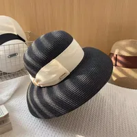 Women's Elegant Vacation Sweet Bow Knot Curved Eaves Straw Hat sku image 1