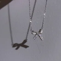 Simple Style Bow Knot Alloy Cable Chain Pendant Necklaces Wholesale main image 1