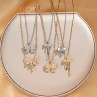 Vacation Classic Style Bow Knot Titanium Steel Copper Bowknot Inlaid Zircon Women's Pendant Necklace main image 1