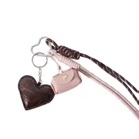 MIU Department Light Luxury Crocodile Pattern Love Bag Pendant Five-pointed Star Flower Woven Hand Rope Bag Accessories Wholesale Factory main image 5