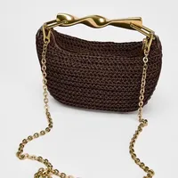 2025 New Special-Interest Design Woven Bag Portable Messenger Bag Metal Handle Straw Bag Beach Holiday Bag Fashion main image 1