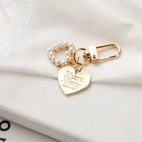 Metal Keychain Wholesale Cute Shell Key Pendant Wholesale Ins Bag Pendant Creative Small Gifts sku image 3