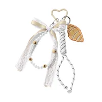 New Ins Exquisite Retro Sweet Tassel Crochet Small Skirt Acrylic Croissant Mirror DIY Keychain main image 5