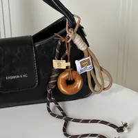 Miu Blogger Same Bag Pendant Alkaline Water Bread Hand Rope Hanging Keychain Accessories Niche High-end main image 2