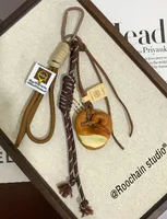 Miu Blogger Same Bag Pendant Alkaline Water Bread Hand Rope Hanging Keychain Accessories Niche High-end sku image 4