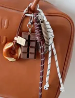 Miu Blogger Same Bag Pendant Alkaline Water Bread Hand Rope Hanging Keychain Accessories Niche High-end sku image 8