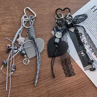 New Miu Style Bow Leather Love Hair Ball Alloy All-match Car Keychain Decorative Bag Personalized Hanging Accessories main image 4