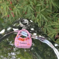 Trendy New Alloy Woven Small Floral Multi-Color Bag Pendant Mobile Phone Chain Keychain Car Pendant Accessories sku image 9