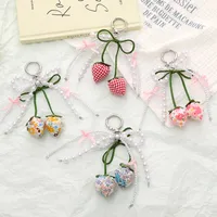 1 Piece Elegant Lady Sweet Strawberry Bow Knot Beaded Beaded Bag Pendant Keychain main image 1
