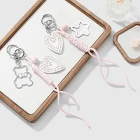 New Ins Stylish Sweet Hollow Cartoon Drip Oil Bear Star Heart Woven Rope DIY Keychain Zinc Alloy Cute Fashion Accessory main image 1