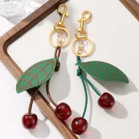 New Miu Series Fashionable High Aesthetic Value Simulated Leather Cherry Leaf Resin Sparkling DIY Keychains Zinc Alloy Sweet Cool Style main image 1