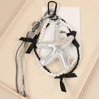 New Sweet Exquisite Glitter Leather Silver Star Keychain Miu Series Pearl Chain Bag Pendant Personalized Design PU Material main image 3