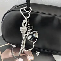 Silver Heart-Shaped Bag Accessories Simple Style Braided Rope Keychain Metal Texture Acrylic Material Super Lightweight main image 1