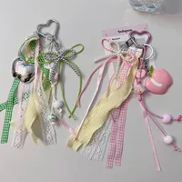Creative Apple Bow Lace Keychain Pearl Earphone Sleeves Lanyard Backpack Accessories New Acrylic Sweet Pattern main image 1