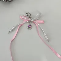 Elegant Silk Ribbon Pearl Bow Pendant Ins Style Heart-Shaped Keychain AirPods Accessory Bag Decoration main image 5
