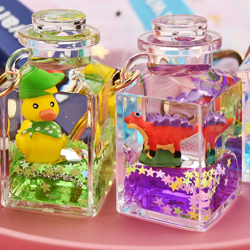 Cute Quicksand Little Yellow Duck Dinosaur Perfume Bottle Acrylic Keychain Wholesale Nihaowholesale