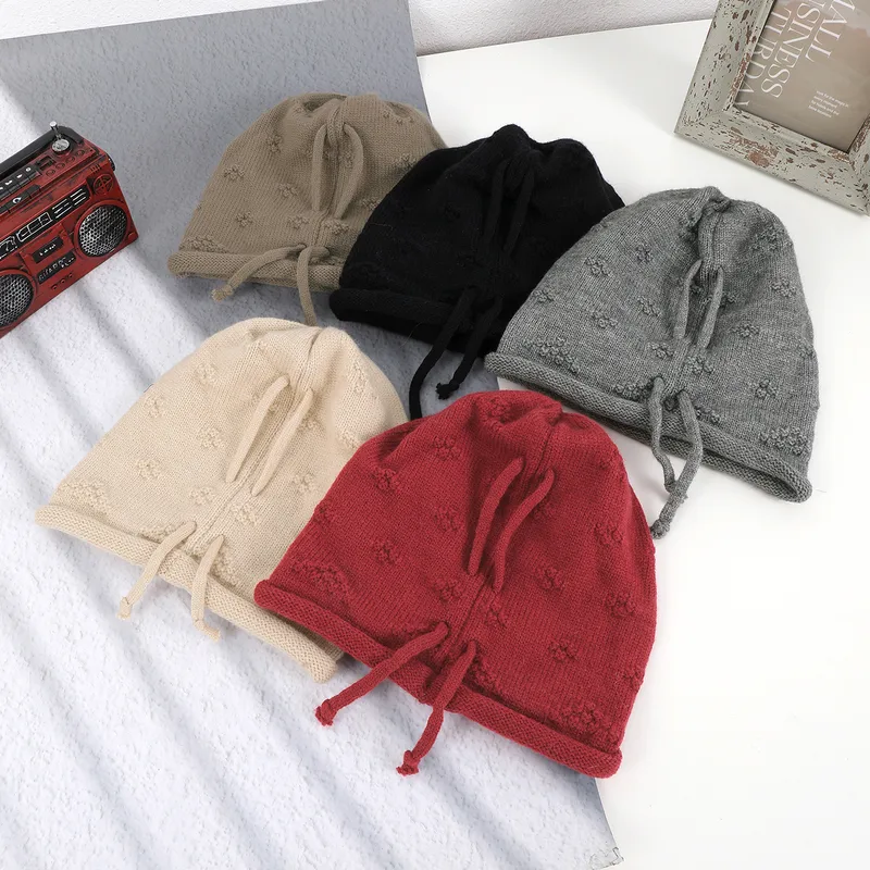 Women's Simple Style Solid Color Flower Drawstring Crimping Wool Cap