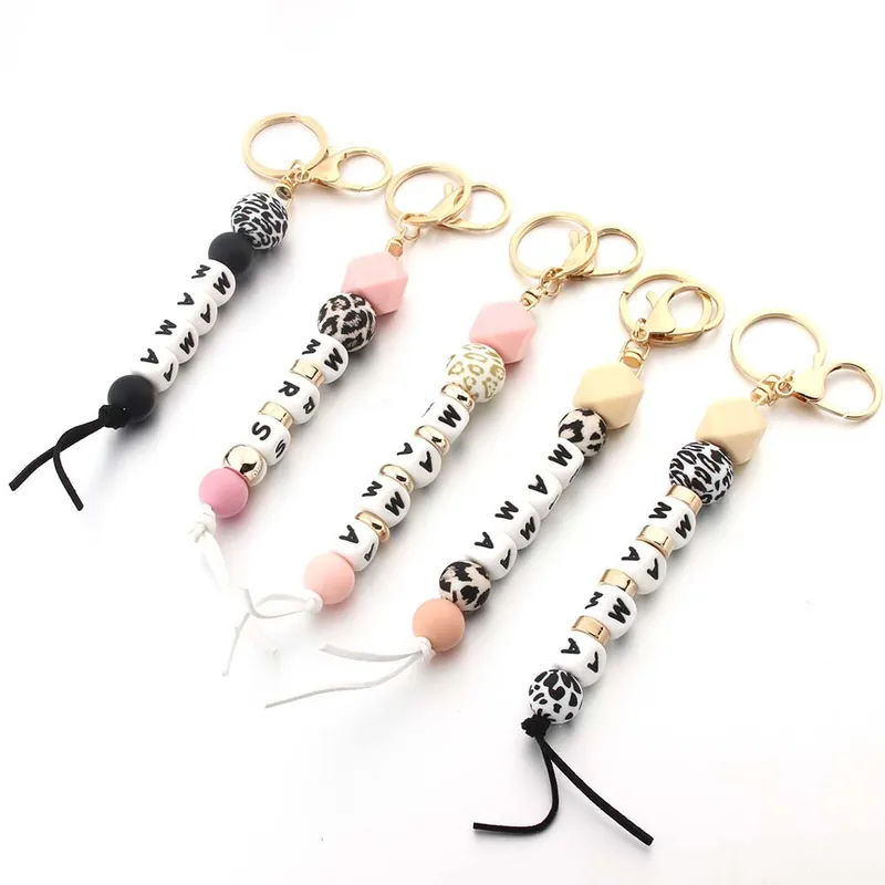 Casual Lips Letter Wood Silica Gel Unisex Keychain