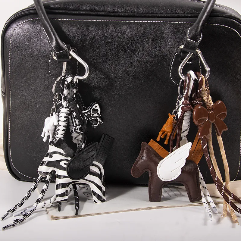 New MIU Cute Leather Pegasus Pendant Pony Bow Woven Rope Keychain Advanced Sense Bag Hanging