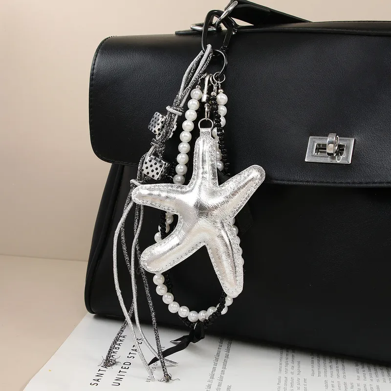 New Sweet Exquisite Glitter Leather Silver Star Keychain Miu Series Pearl Chain Bag Pendant Personalized Design PU Material
